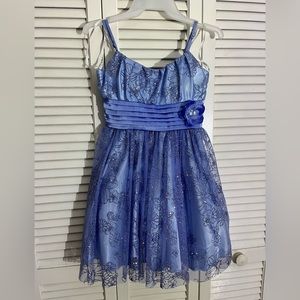 Blue sparkly spaghetti strap homecoming dress.